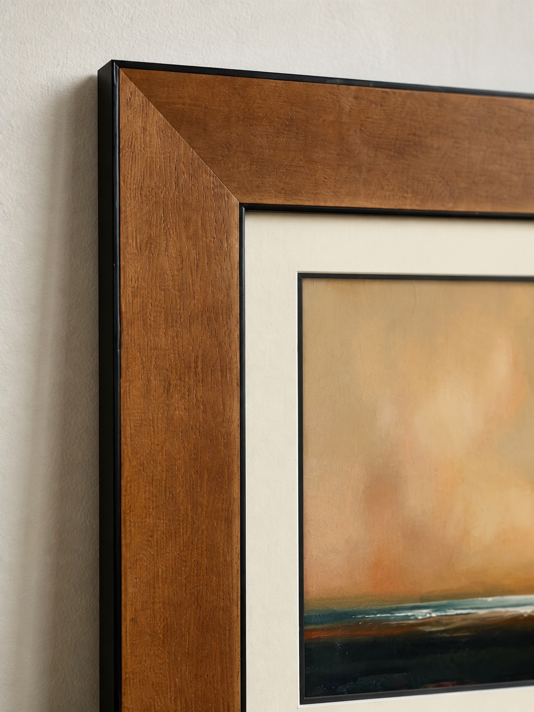 MOOJI ART warm brown solid-wood frame corner, cream mat, black inner border and landscape print detail
