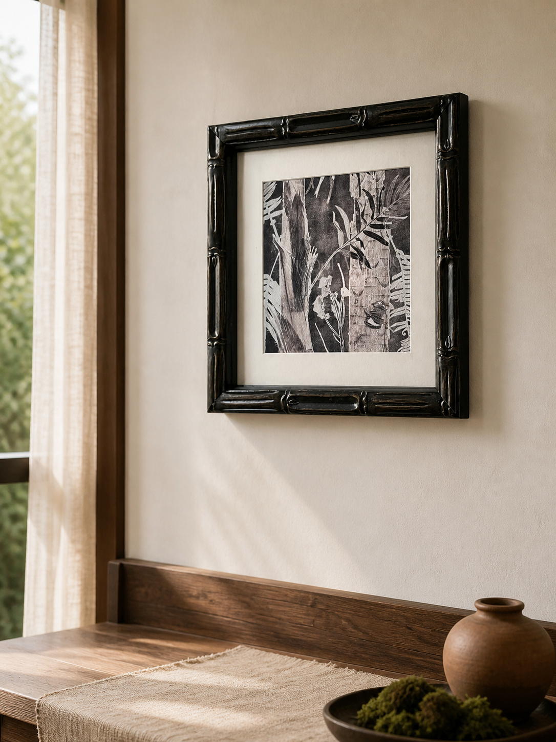 MOOJI ART monochrome botanical foliage framed wall art with black solid-wood frame in a bedroom setting