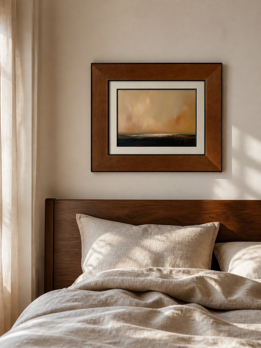 MOOJI ART warm amber landscape framed wall art with cream mat above a walnut bed in a bedroom